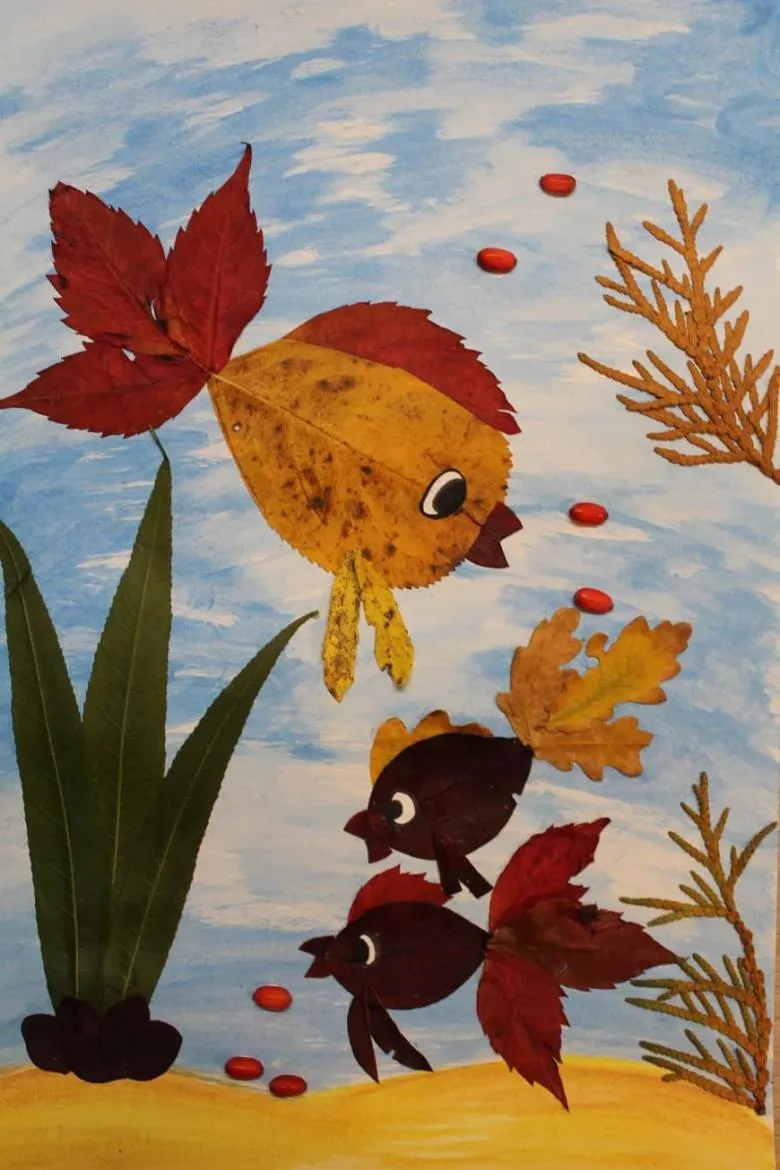 Аплікація риб з листя і кольорового паперу 