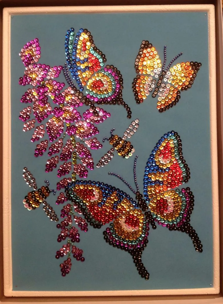 Панно метеликів з кольорового бісеру 