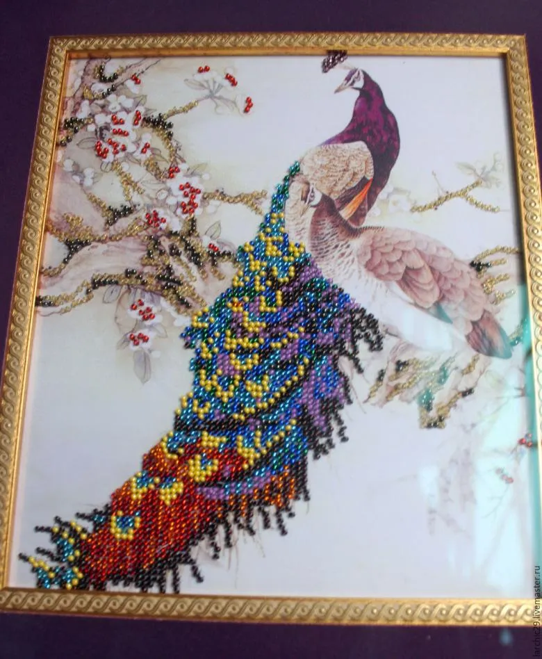 Панно птахів з кольорового бісеру 
